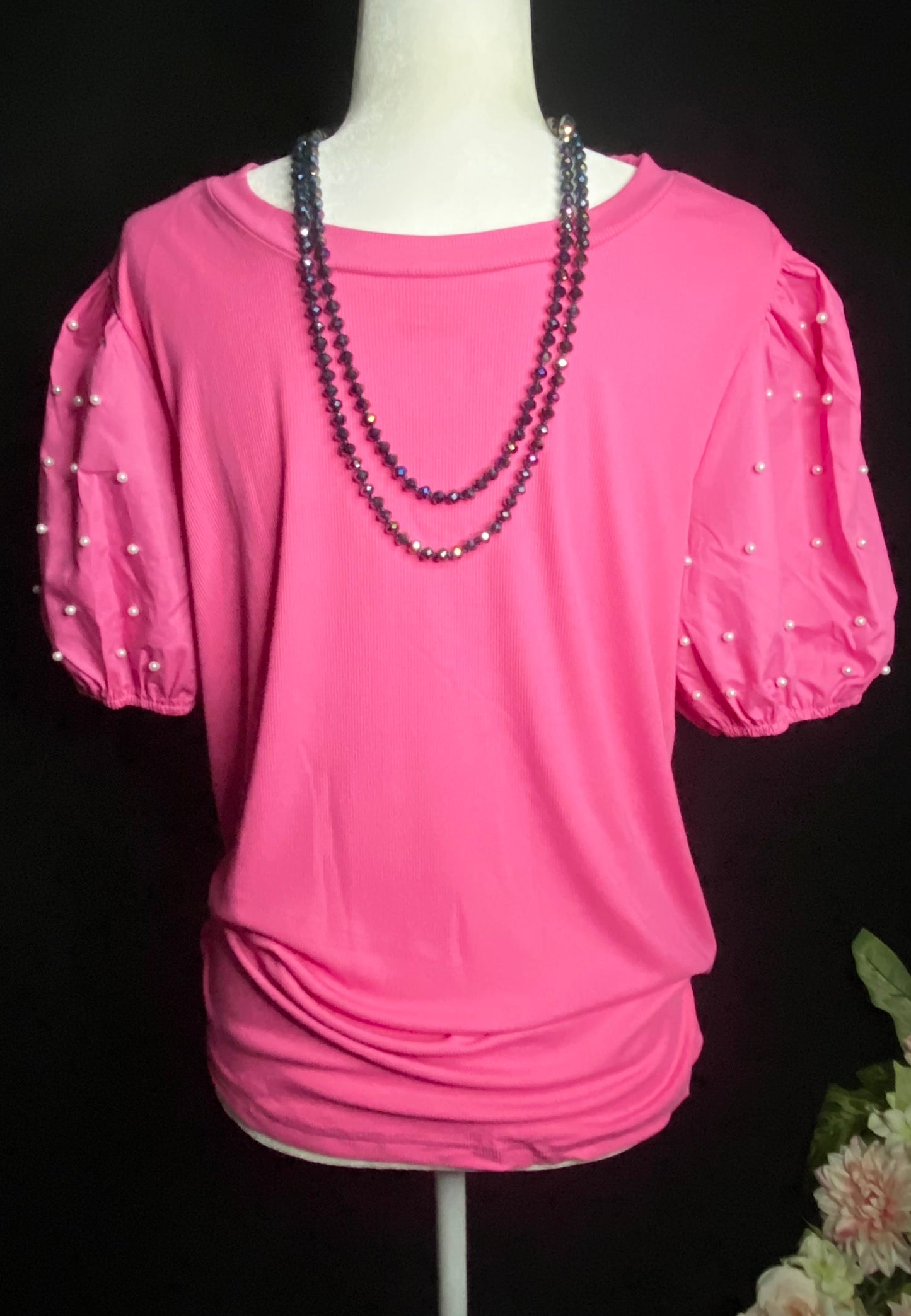 Pearls and pink top