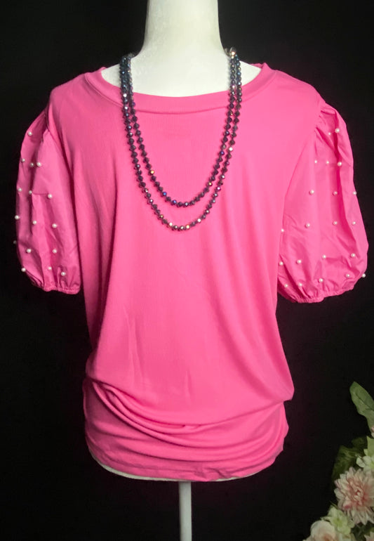 Pearls and pink top