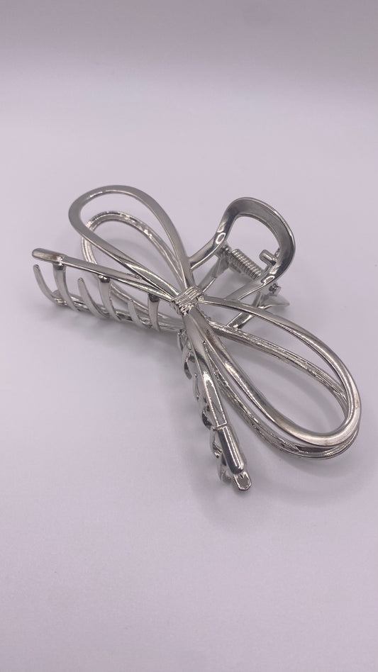 Shiny silver butterfly clip