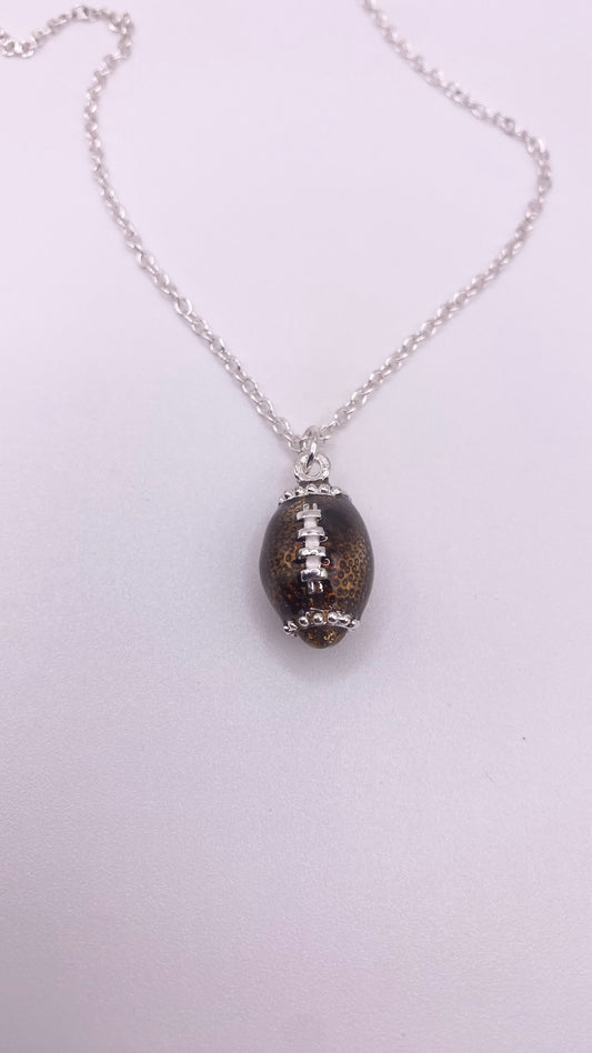 Game on football necklace